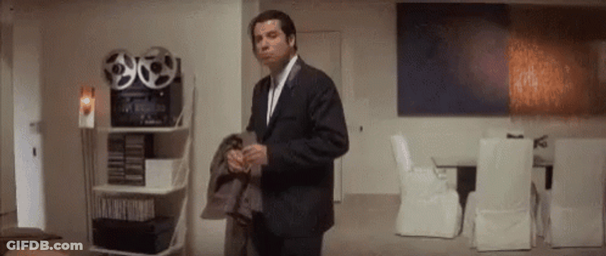 John Travolta Looking Behind To Search GIF