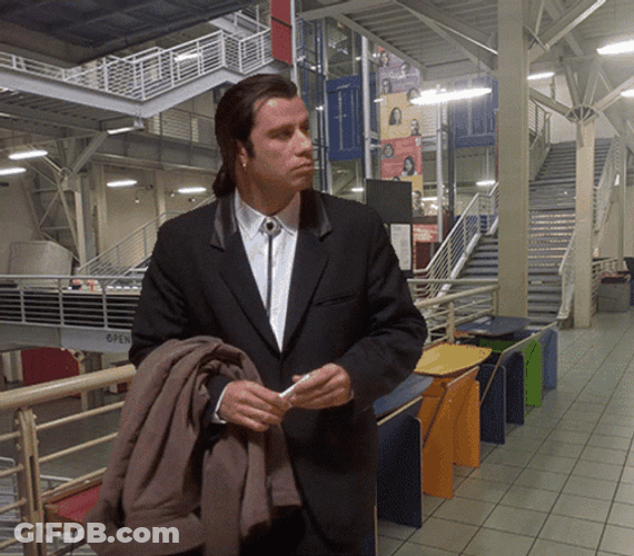 John Travolta Looking For Something GIF