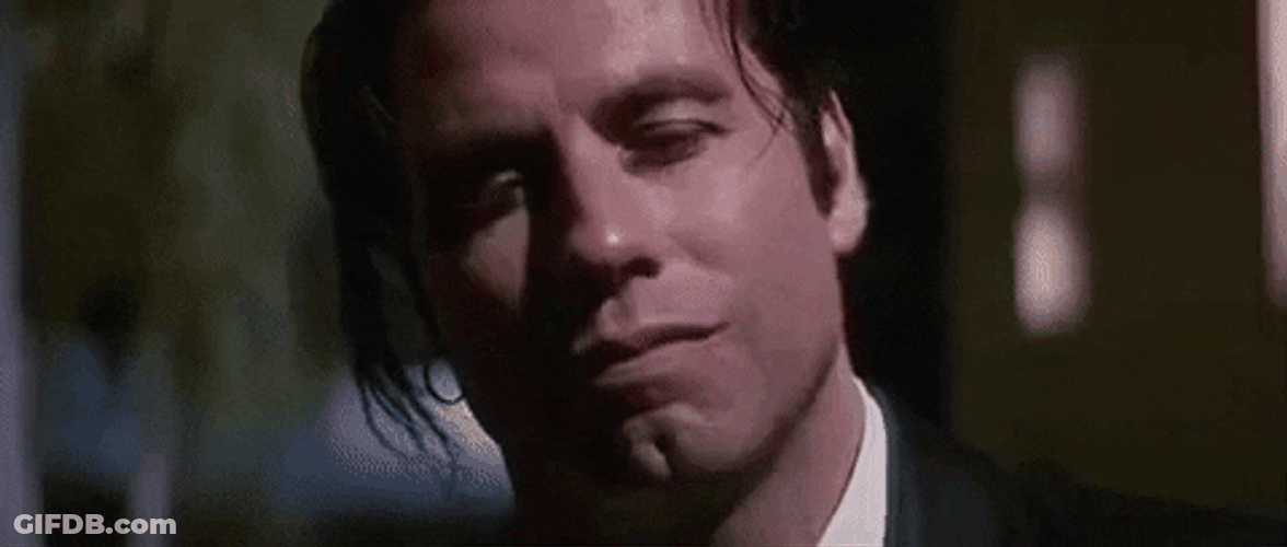 John Travolta Pulp Fiction Blowing Kiss GIF