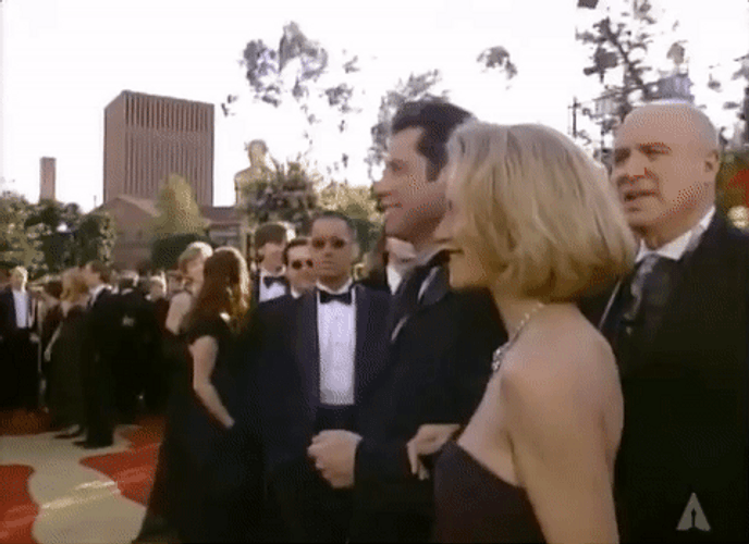 John Travolta Waving Hello GIF