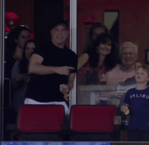 John Travolta With People Dancing Behind GIF
