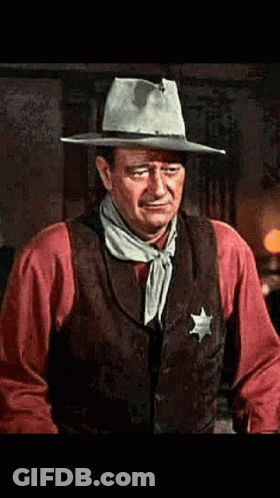 John Wayne Cowboy Hat Vest Sheriff Badge GIF