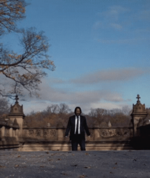 John Wick With Dog GIF