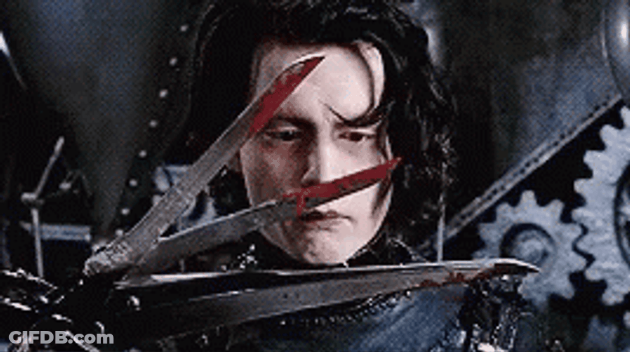 Johnny Depp Checking Out His Scissor Hands GIF