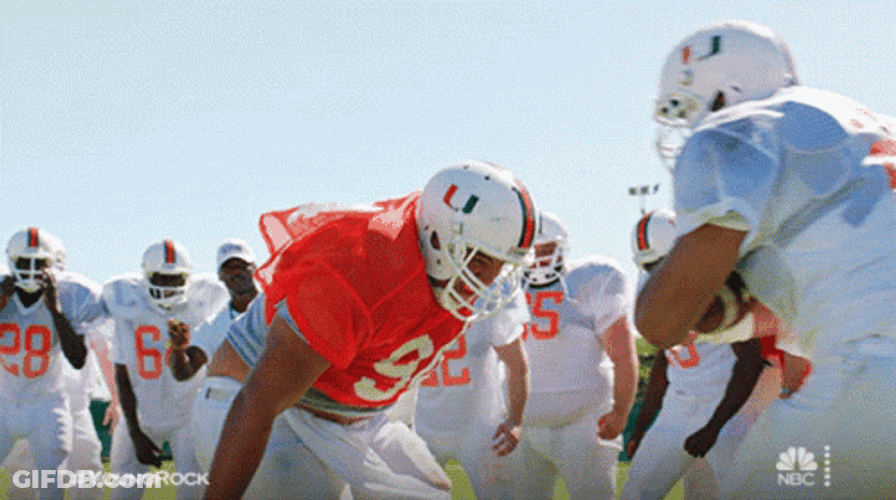 Johnny Manziel Teammates Tackling GIF