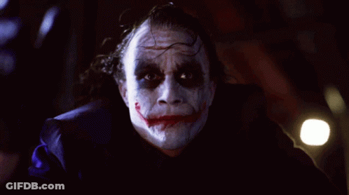 Joker Close Up With Purple Background GIF