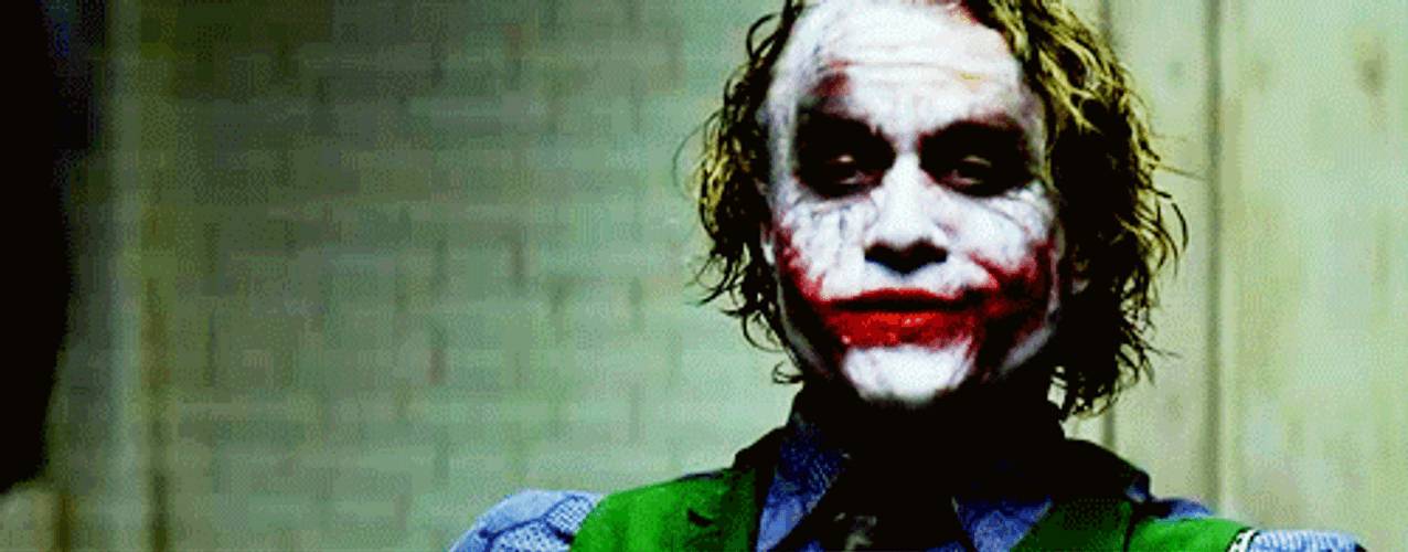 Joker Disappointedly Smiling GIF