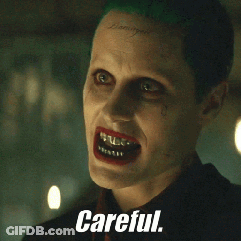 Joker Face Saying Careful GIF