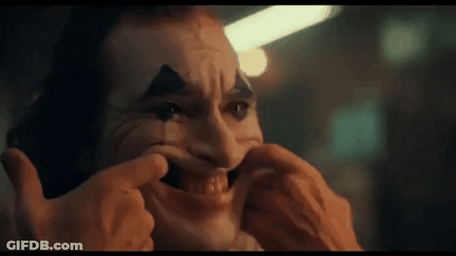 Joker Forcibly Smiling GIF