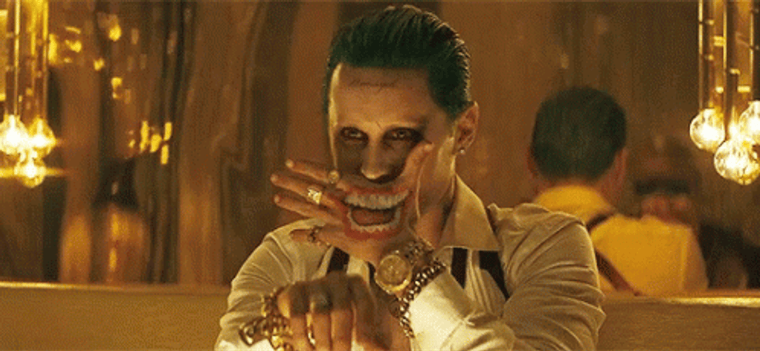 Joker Hand With Smiling Tattoo GIF