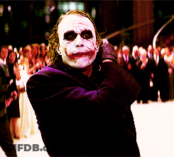Joker In Purple Suit And Gloves Before Crowd GIF