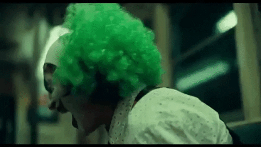 Joker Laughing Alone GIF