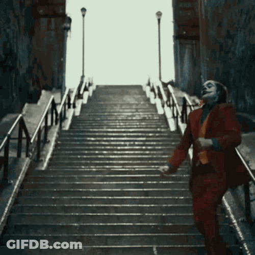 Joker Laughing And Dancing In The Rain GIF