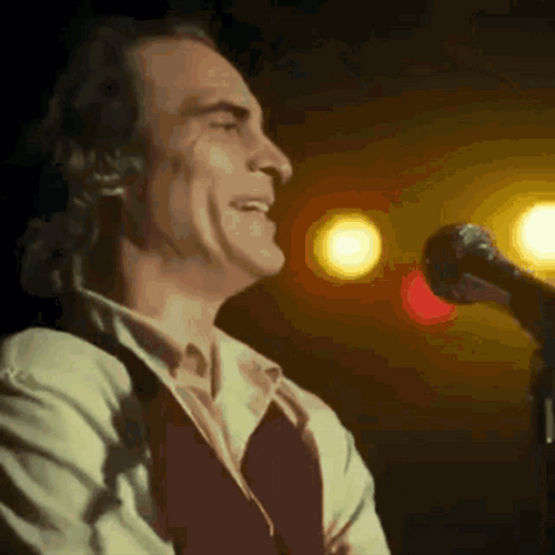 Joker Laughing At The Stage Joaquin Phoenix GIF