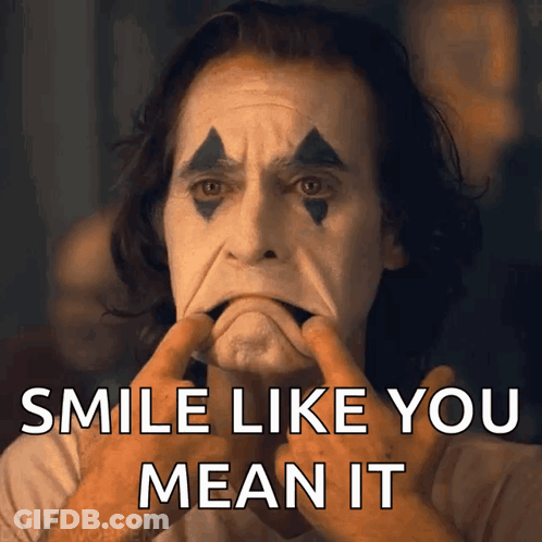 Joker Making A Face Smile Like You Mean It GIF