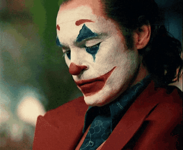 Joker Sadly Looking Down GIF