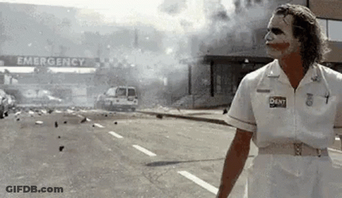 Joker Standing In Front Of Emergency Room GIF