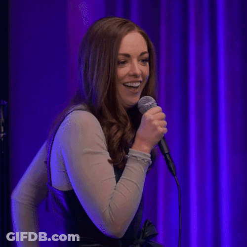 Jolly Guilty Girl Raising A Hand GIF