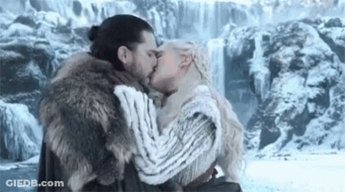 Jon Snow And Daenerys Targaryen Are Kissing In Front Of A Waterfall In Game Of Thrones . GIF