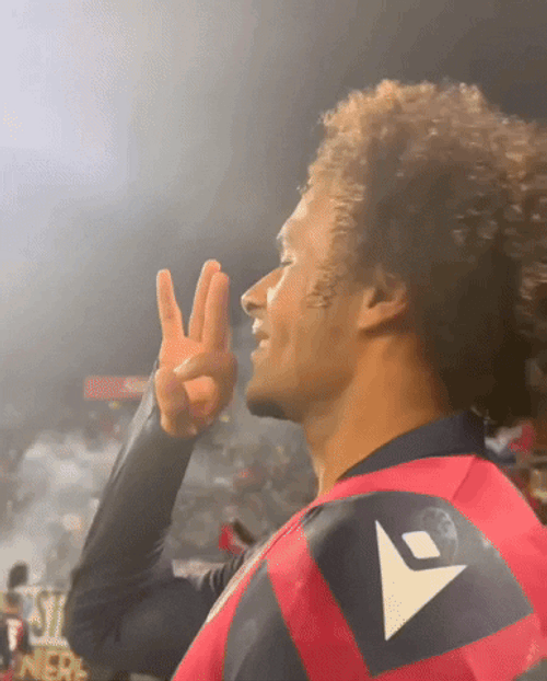 Joshua Zirkzee Being Goofy Peace Sign GIF