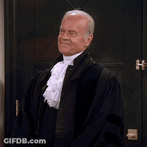 Judge In Robe Saying My Pleasure In Front Of Door GIF