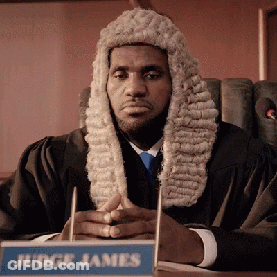 Judge James Sitting At Desk GIF