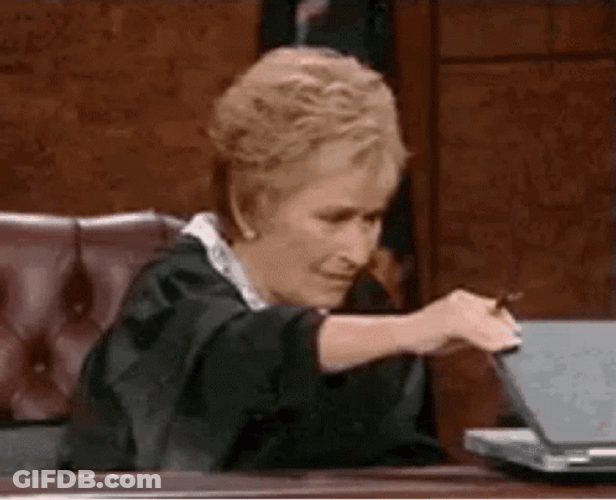 Judge Judy Slowly Closing Laptop GIF