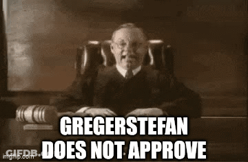 Judge Sitting At Desk With Book GIF