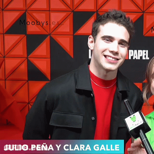 Julio Peña And Clara Galle Being Interviewed GIF