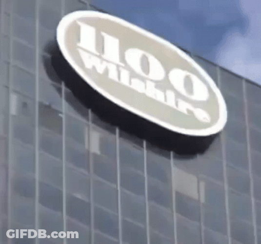 Jump Out Window 1100 Wilshire Building GIF