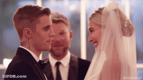 Justin Bieber And Hailey Baldwin Are Looking At Each Other GIF