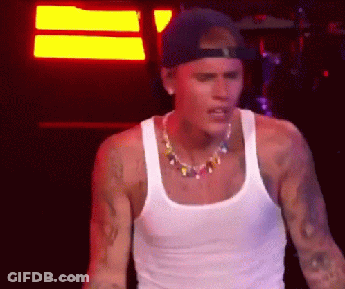 Justin Bieber In White Tank Top And Cap GIF