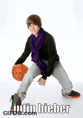 Justin Bieber Is Holding A Spalding Basketball GIF