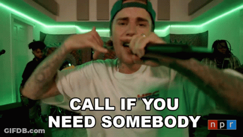 Justin Bieber Singing Into A Microphone With The Words Call If You Need Somebody Npr GIF