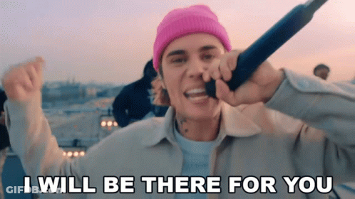 Justin Bieber Singing Into A Microphone With The Words " I Will Be There For You " GIF