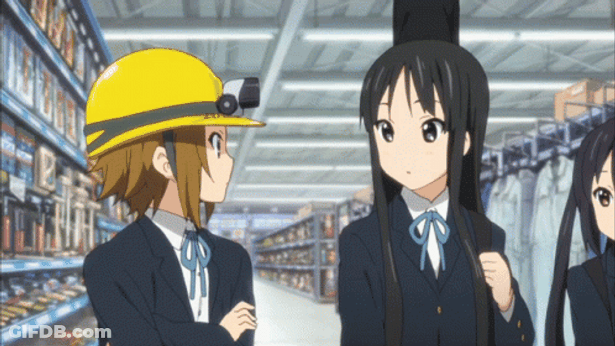 K-On Yui Hirasawa Flashing Light On Mio Akiyama GIF