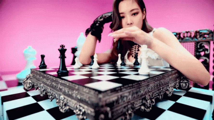 K-Pop Jennie Kim Knocking Down Chess Piece GIF