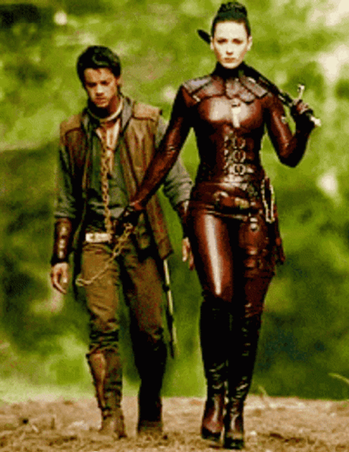 Kahlan Amnell Red Leather Suit Pulling Slave GIF