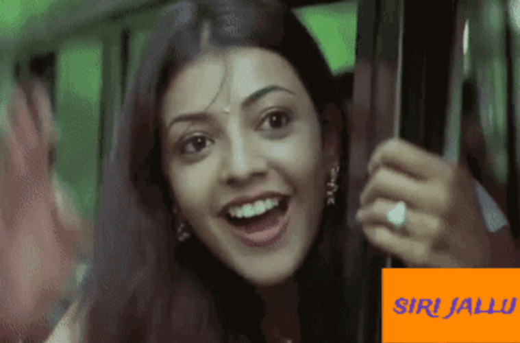 Kajal Aggarwal Hello Siri While Waving Hand GIF