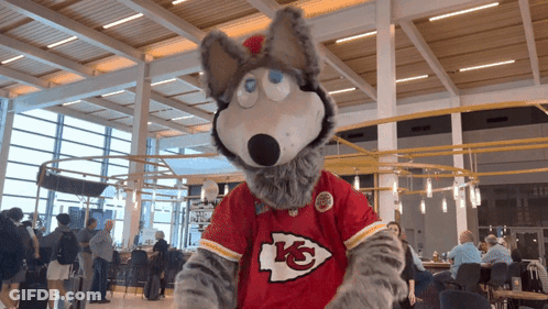 Kansas City Chiefs Mascot In Red And Yellow Jersey GIF