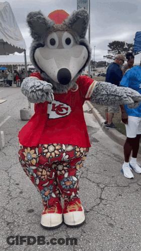 Kansas City Chiefs Mascot In Red Shirt And Floral Pants GIF