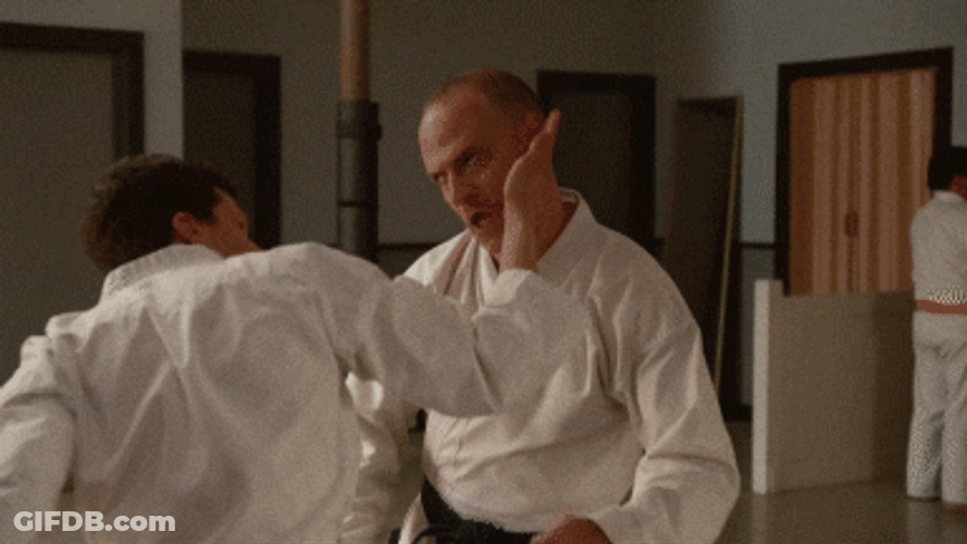 Karate Chop With Face Slap GIF