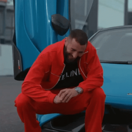 Karim Benzema Red Jacket And Pants Photoshoot GIF