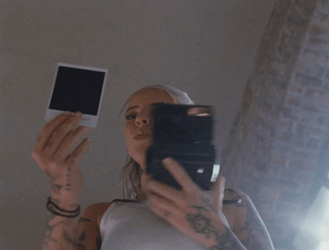 Karol G Polaroid Picture GIF