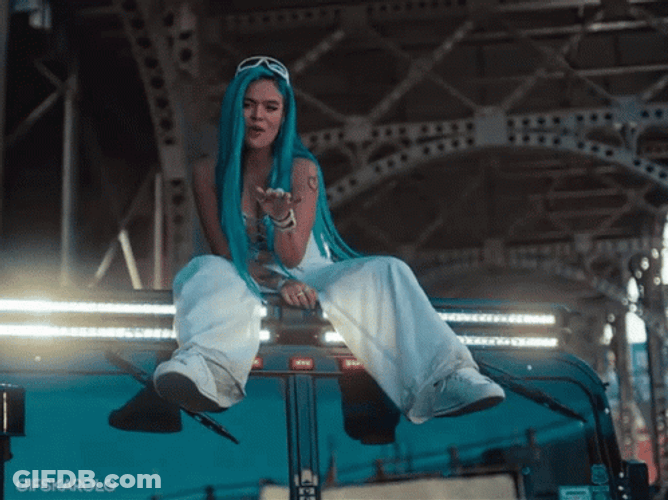 Karol G Sitting On A Light GIF