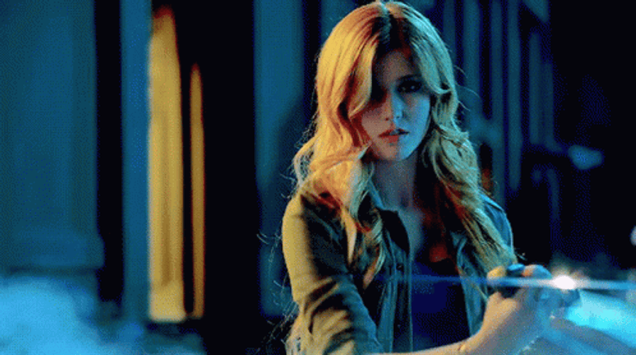Katherine Mcnamara Playing With Knife GIF