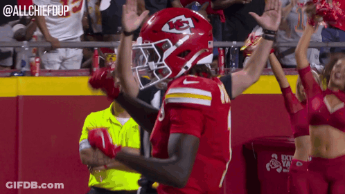 KC Football Player Celebrating Touchdown With Cheerleaders GIF