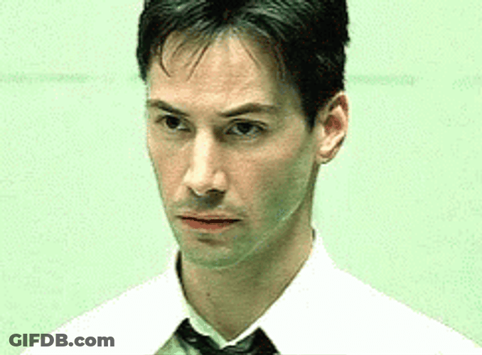Keanu Reeves Being Suspicious GIF