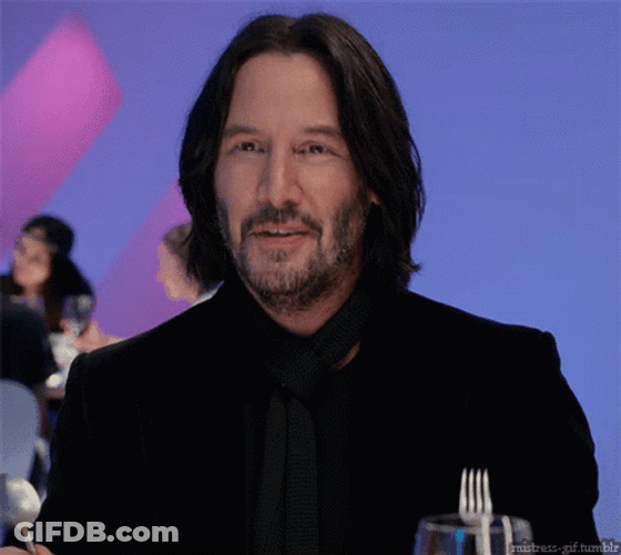 Keanu Reeves With Fork And Spoon GIF