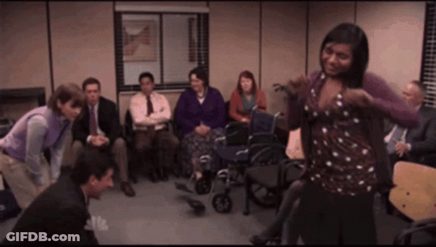 Kelly Kapoor Dancing While Co Worker Giving Cpr GIF